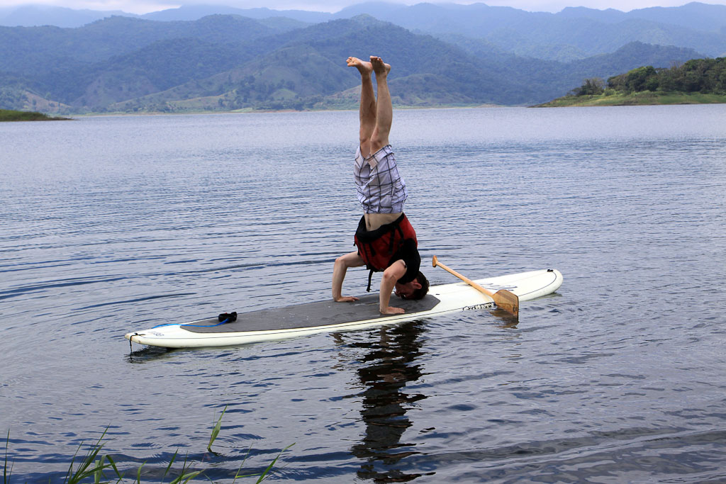        sup lake arenal headstand 
  - Costa Rica